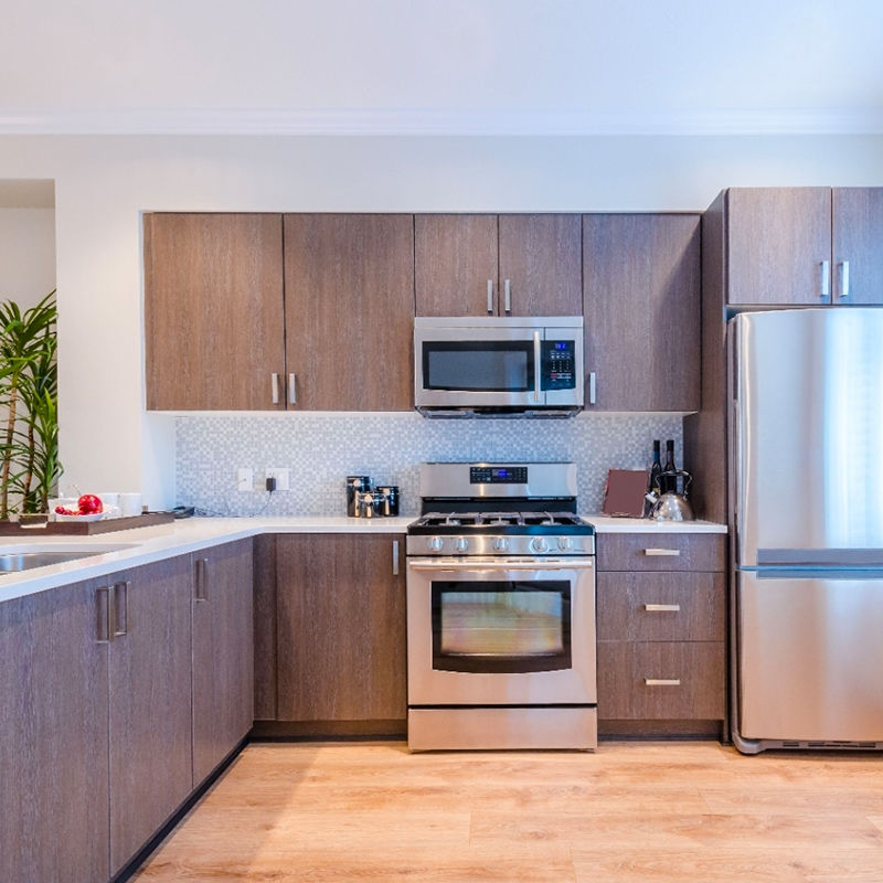 Professional appliance installation with proper connections and testing.